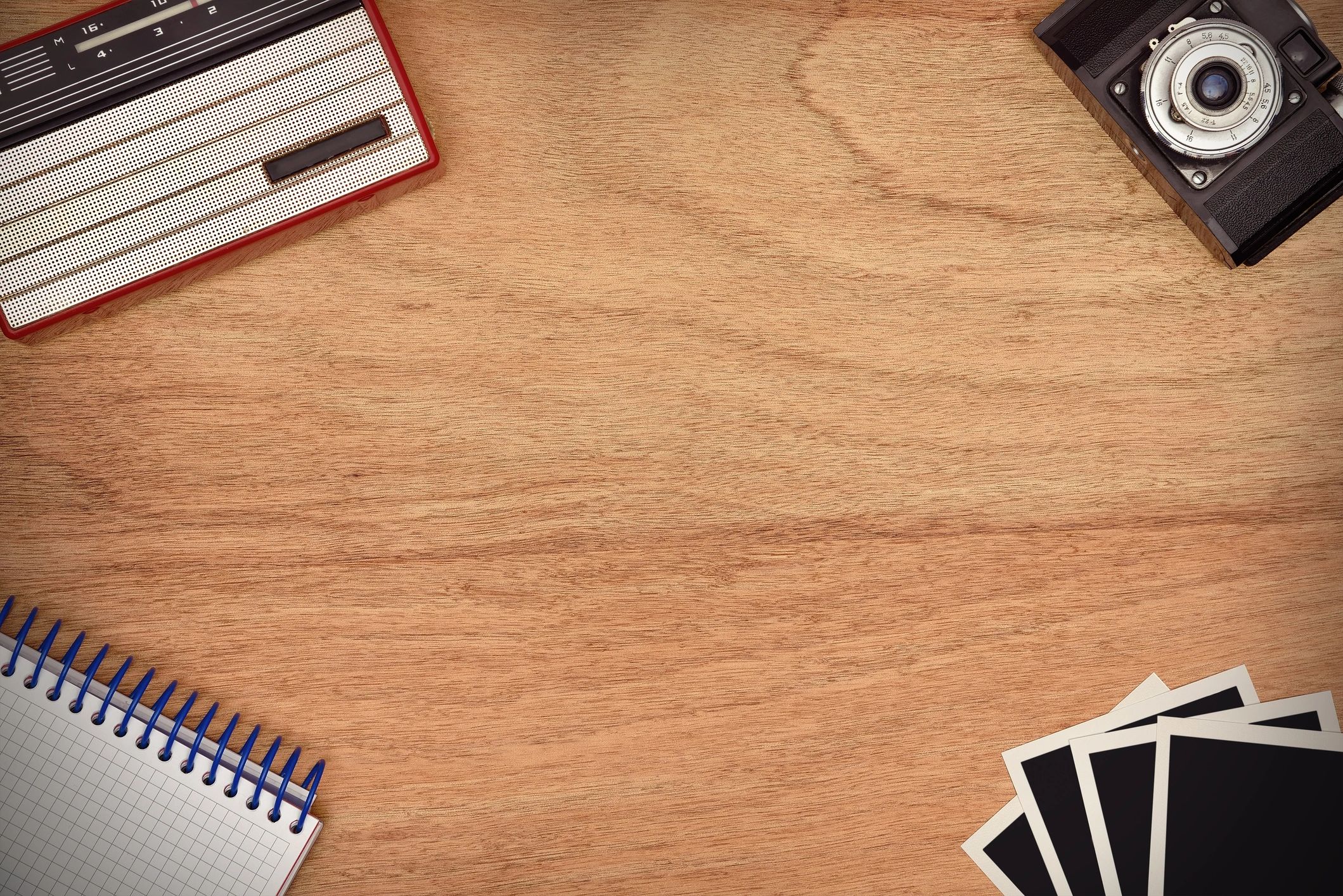 Trading cards and collectibles on a desk with space for notes